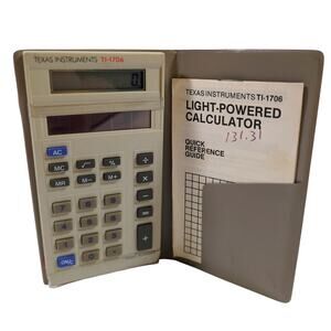 Vintage Texas Instruments TI-1706 Light-Powered Calculator with Case & Manual